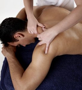 Male Patient getting a massage in sydney