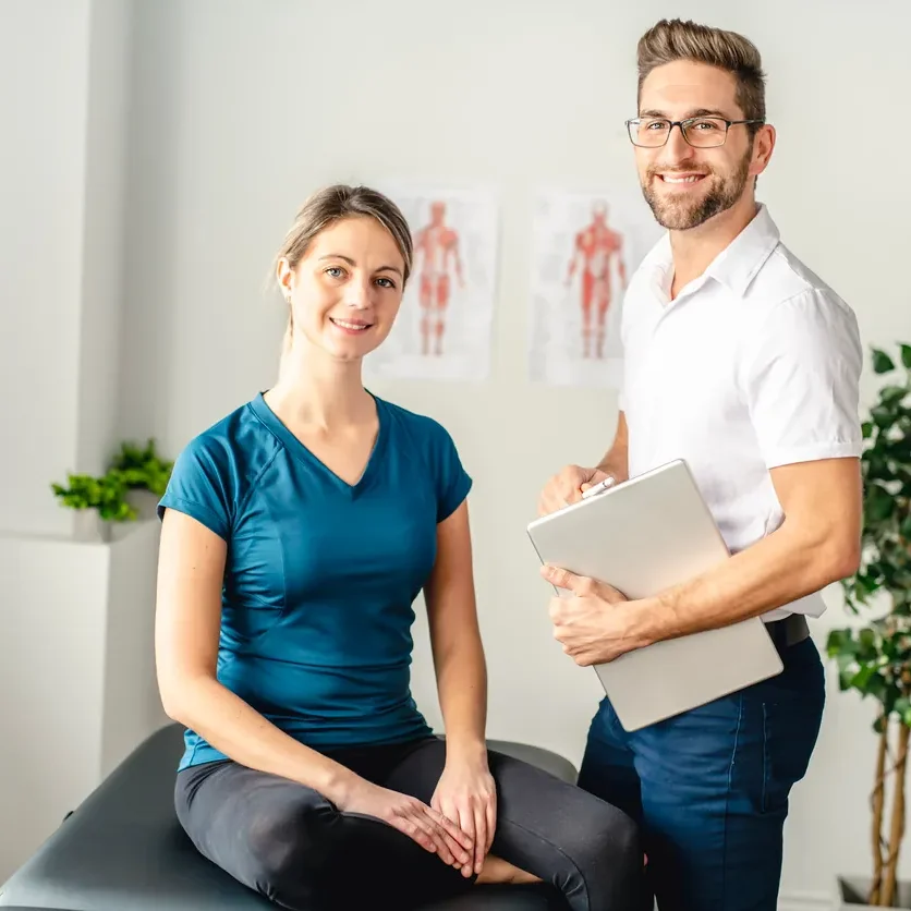 male practitioner with female practitioner with another person