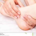 woman-receiving-osteopathic-treatment-her-foot-joint-young-s-being-manipulated-manual-therapist-physician-99877163